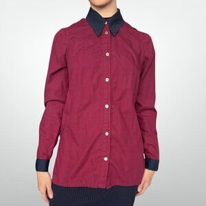 Handmade button up shirt with contracting collar and cuffs.